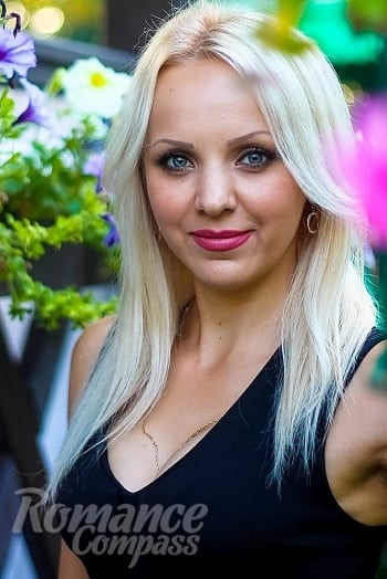 Ukrainian mail order bride Ekaterina from Lviv with blonde hair and blue eye color - image 1