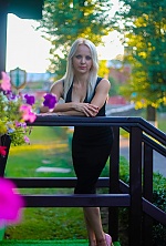 Ukrainian mail order bride Ekaterina from Lviv with blonde hair and blue eye color - image 8
