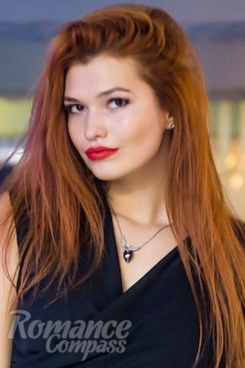 Ukrainian mail order bride Zorina from Donetsk with red hair and brown eye color - image 1