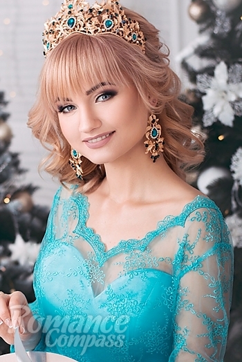 Ukrainian mail order bride Julia from Nikopol with blonde hair and blue eye color - image 1