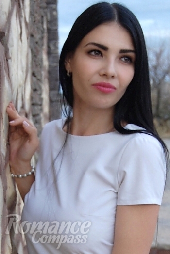 Ukrainian mail order bride Maria from Nikolaev with black hair and brown eye color - image 1