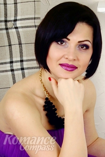 Ukrainian mail order bride Anna from Kharkiv with black hair and brown eye color - image 1