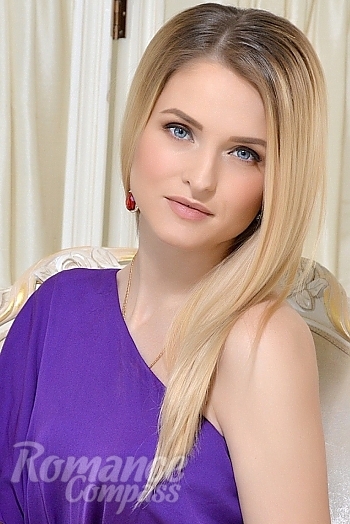 Ukrainian mail order bride Tanya from Kiev with blonde hair and blue eye color - image 1