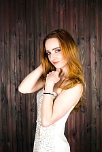 Ukrainian mail order bride Olga from Kiev with red hair and green eye color - image 3