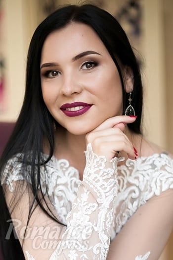 Ukrainian mail order bride Maria from Ivano-Frankovsk with black hair and hazel eye color - image 1
