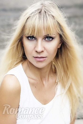 Ukrainian mail order bride Anastasia from Odessa with blonde hair and grey eye color - image 1