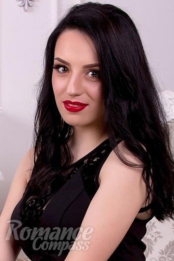 Ukrainian mail order bride Veronika from Chisinau with black hair and hazel eye color - image 1