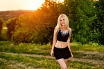 Ukrainian mail order bride Oksana from Poltava with blonde hair and blue eye color - image 10