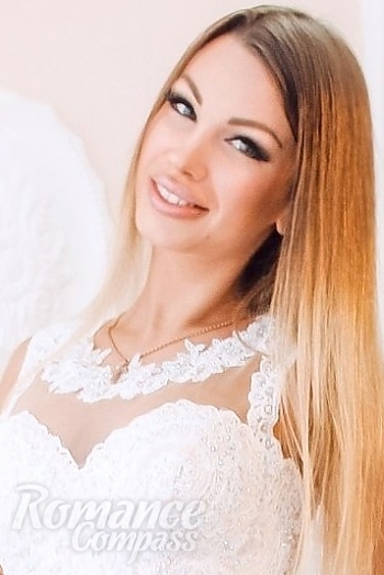Ukrainian mail order bride Natalia from Kiev with light brown hair and green eye color - image 1