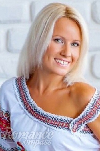 Ukrainian mail order bride Larisa from Dnipro with blonde hair and green eye color - image 1