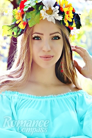 Ukrainian mail order bride Anastasiya from Donetsk with light brown hair and green eye color - image 1