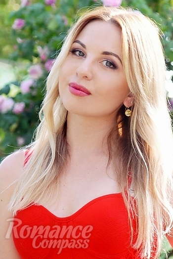 Ukrainian mail order bride Ilona from Kharkov with blonde hair and blue eye color - image 1