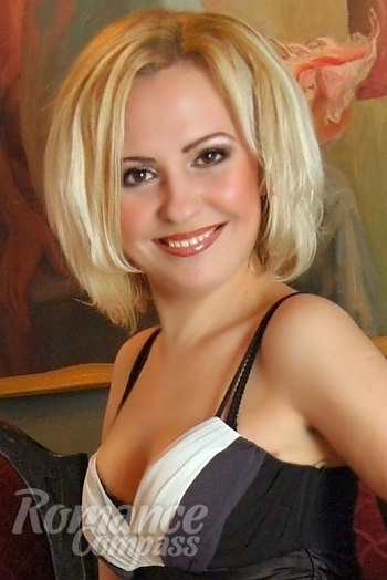 Ukrainian mail order bride Oksana from Dnipro with blonde hair and hazel eye color - image 1