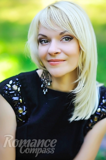 Ukrainian mail order bride Inna from Dnipro with blonde hair and green eye color - image 1