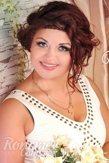 Ukrainian mail order bride Miroslava from Kharkov with brunette hair and blue eye color - image 1