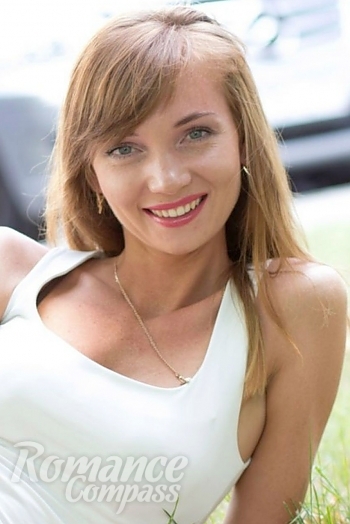 Ukrainian mail order bride Yana from Nikolaev with auburn hair and grey eye color - image 1