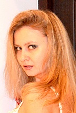 Ukrainian mail order bride Olga from Smila with blonde hair and green eye color - image 11