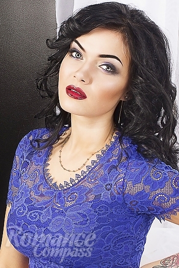Ukrainian mail order bride Inna from Odessa with black hair and green eye color - image 1