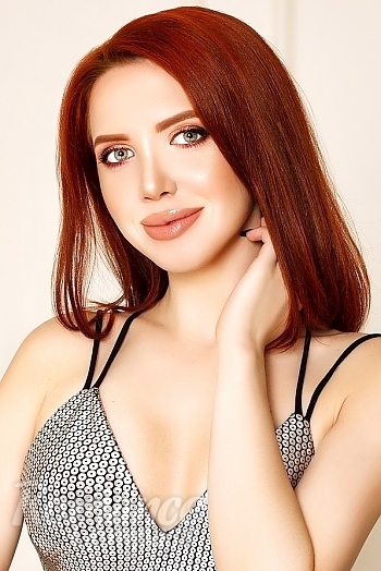 Ukrainian mail order bride Alexandra from Kyiv with red hair and green eye color - image 1