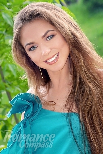 Ukrainian mail order bride Anna from Kharkov with light brown hair and green eye color - image 1