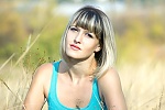 Ukrainian mail order bride Anastasiya from Kyiv with light brown hair and green eye color - image 5