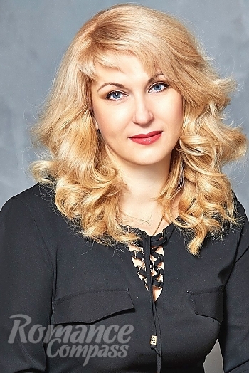 Ukrainian mail order bride Aksana from Vitebsk with blonde hair and blue eye color - image 1