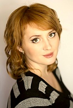 Ukrainian mail order bride Oksana from Kiev with auburn hair and hazel eye color - image 2