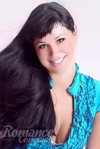 Ukrainian mail order bride Oksana from Lugansk with brunette hair and brown eye color - image 1