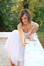 Ukrainian mail order bride Olga from Mikolayiv with brunette hair and green eye color - image 9