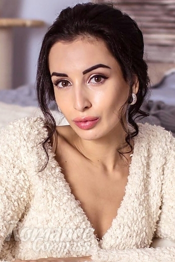 Ukrainian mail order bride Vladislava from Odessa with black hair and brown eye color - image 1