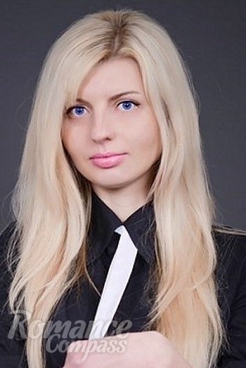 Ukrainian mail order bride Oksana from Ternopol with blonde hair and blue eye color - image 1