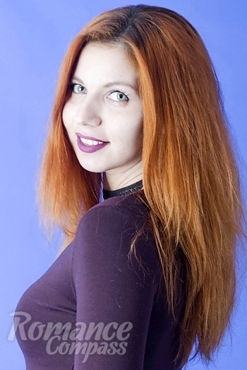 Ukrainian mail order bride Viktoriya from Piryatin with auburn hair and green eye color - image 1