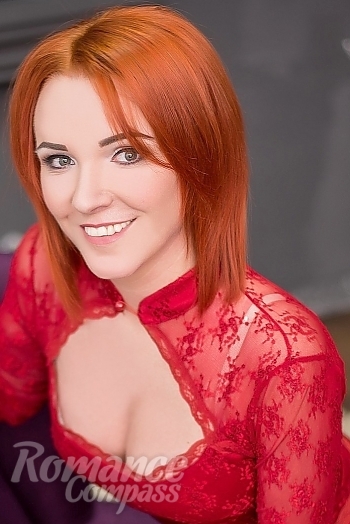 Ukrainian mail order bride Natalia from Oktyabrskoe with red hair and green eye color - image 1