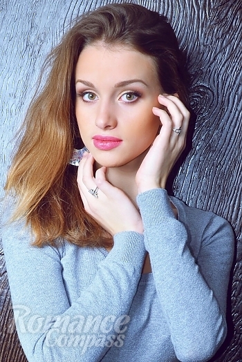 Ukrainian mail order bride Maria from Kharkiv with light brown hair and green eye color - image 1