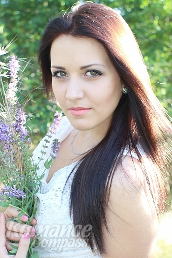 Ukrainian mail order bride Anna from Nikolaev with light brown hair and green eye color - image 1