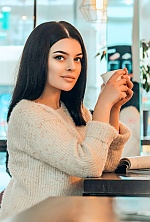 Ukrainian mail order bride Anastasia from Kiev with black hair and blue eye color - image 9