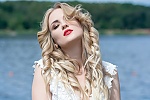 Ukrainian mail order bride Daria from Kamenskoe with blonde hair and green eye color - image 3
