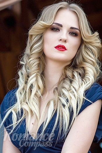 Ukrainian mail order bride Daria from Kamenskoe with blonde hair and green eye color - image 1