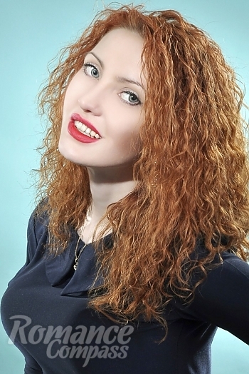 Ukrainian mail order bride Irina from Kiev with red hair and blue eye color - image 1