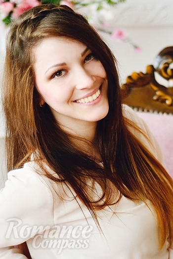 Ukrainian mail order bride Olya from Odessa with light brown hair and brown eye color - image 1