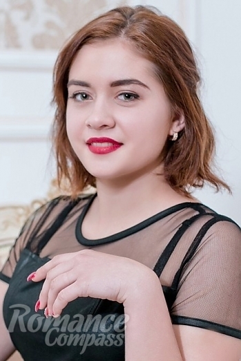 Ukrainian mail order bride Karina from Odessa with brunette hair and brown eye color - image 1