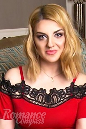 Ukrainian mail order bride Natalia from Kiev with blonde hair and green eye color - image 1