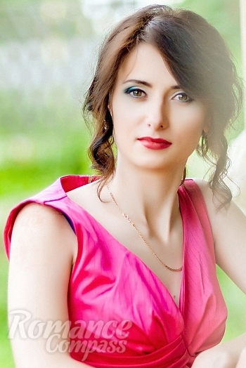 Ukrainian mail order bride Ruslana from Lutsk with black hair and brown eye color - image 1