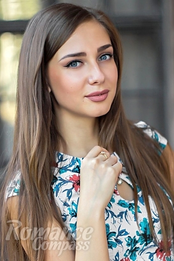 Ukrainian mail order bride Vitalia from Donetsk with light brown hair and blue eye color - image 1