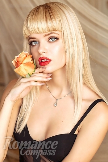 Ukrainian mail order bride Anna from Kiev with blonde hair and grey eye color - image 1
