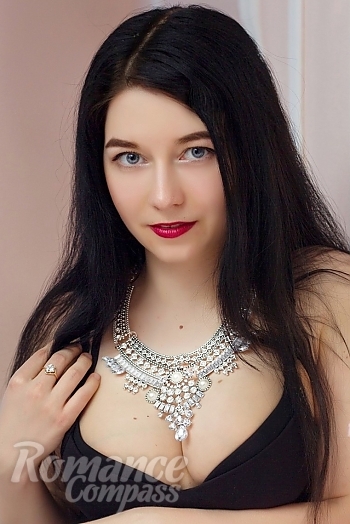 Ukrainian mail order bride Juliya from Kiev with black hair and blue eye color - image 1