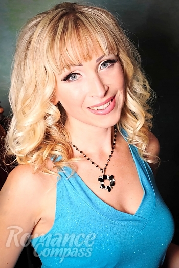Ukrainian mail order bride Viktoria from Lugansk with blonde hair and grey eye color - image 1