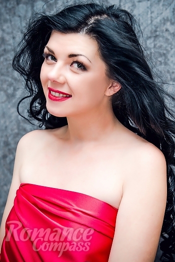 Ukrainian mail order bride Elena from Lugansk with black hair and green eye color - image 1