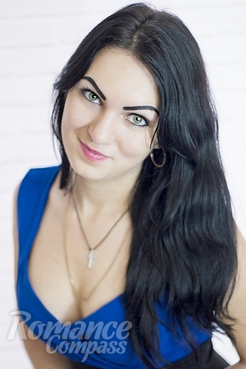 Ukrainian mail order bride Elena from Berdiansk with black hair and green eye color - image 1