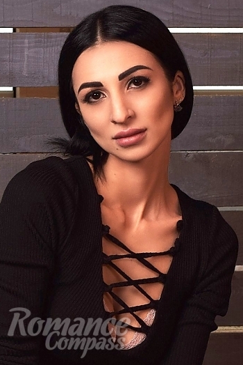 Ukrainian mail order bride Kate from Sochi with black hair and black eye color - image 1
